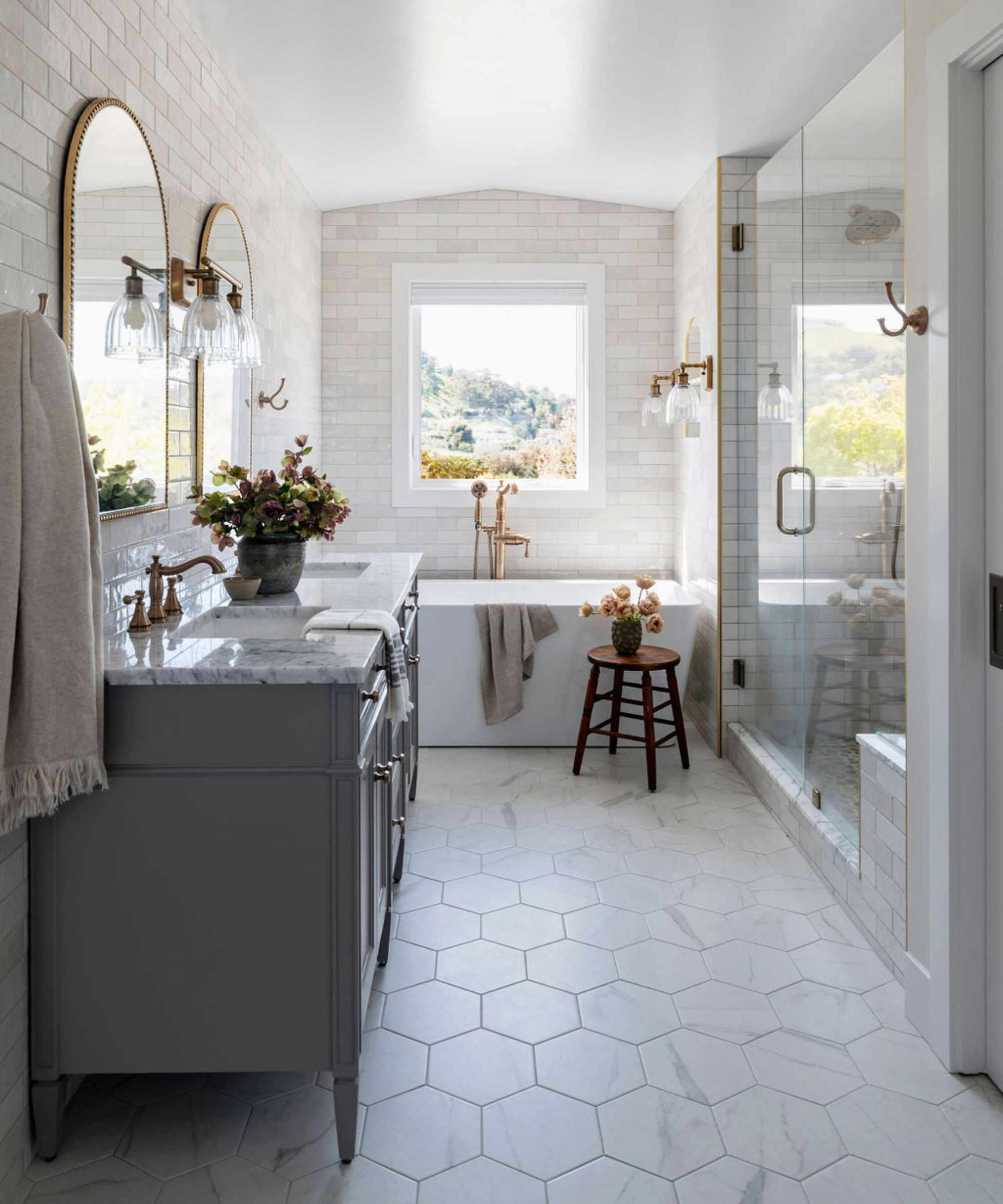 Marble bathroom with wooden vanity unit