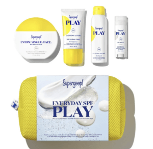 A small, yellow, zippered pouch is pictured. Above it are four travel sized sunscreen projects.