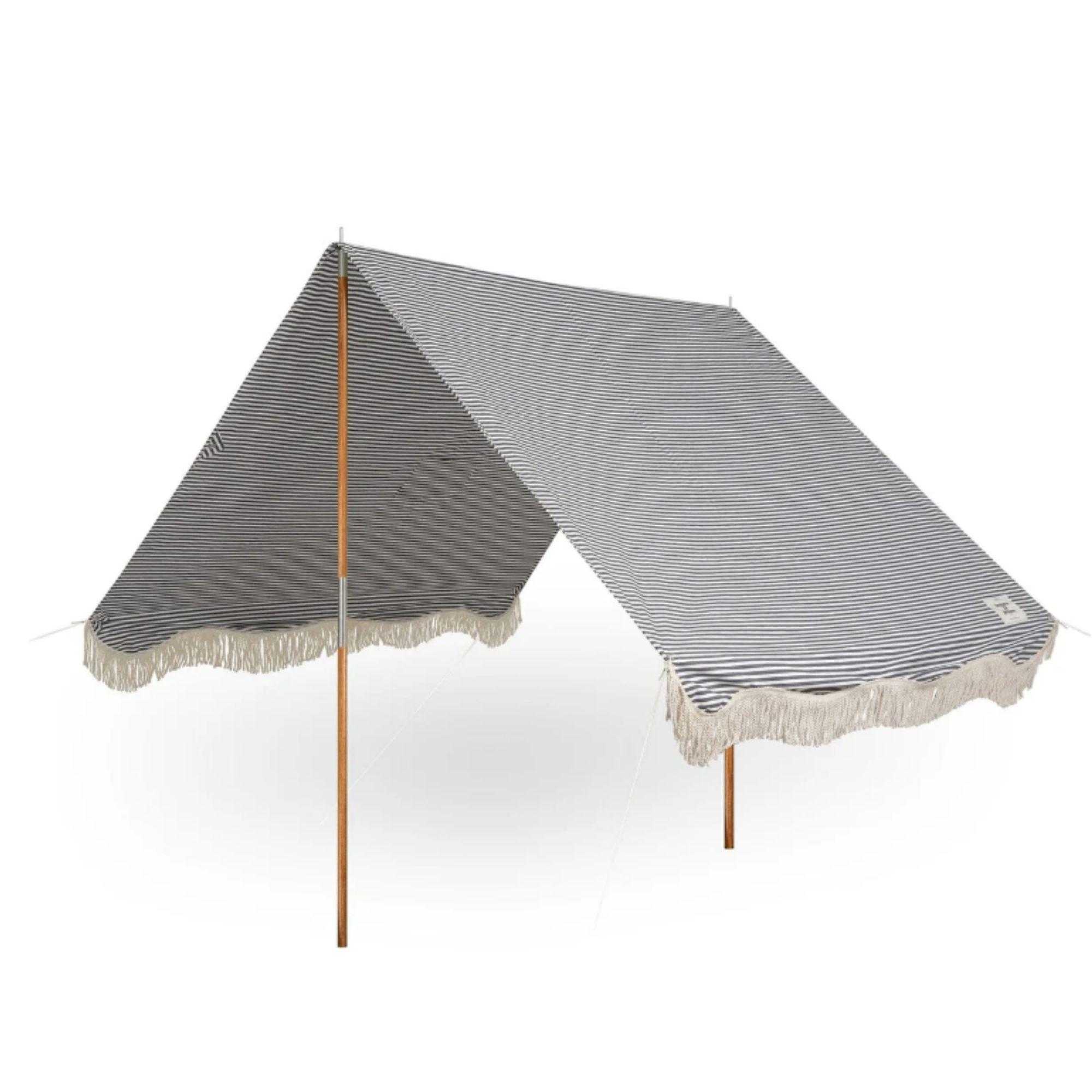 Blue and white striped beach tent