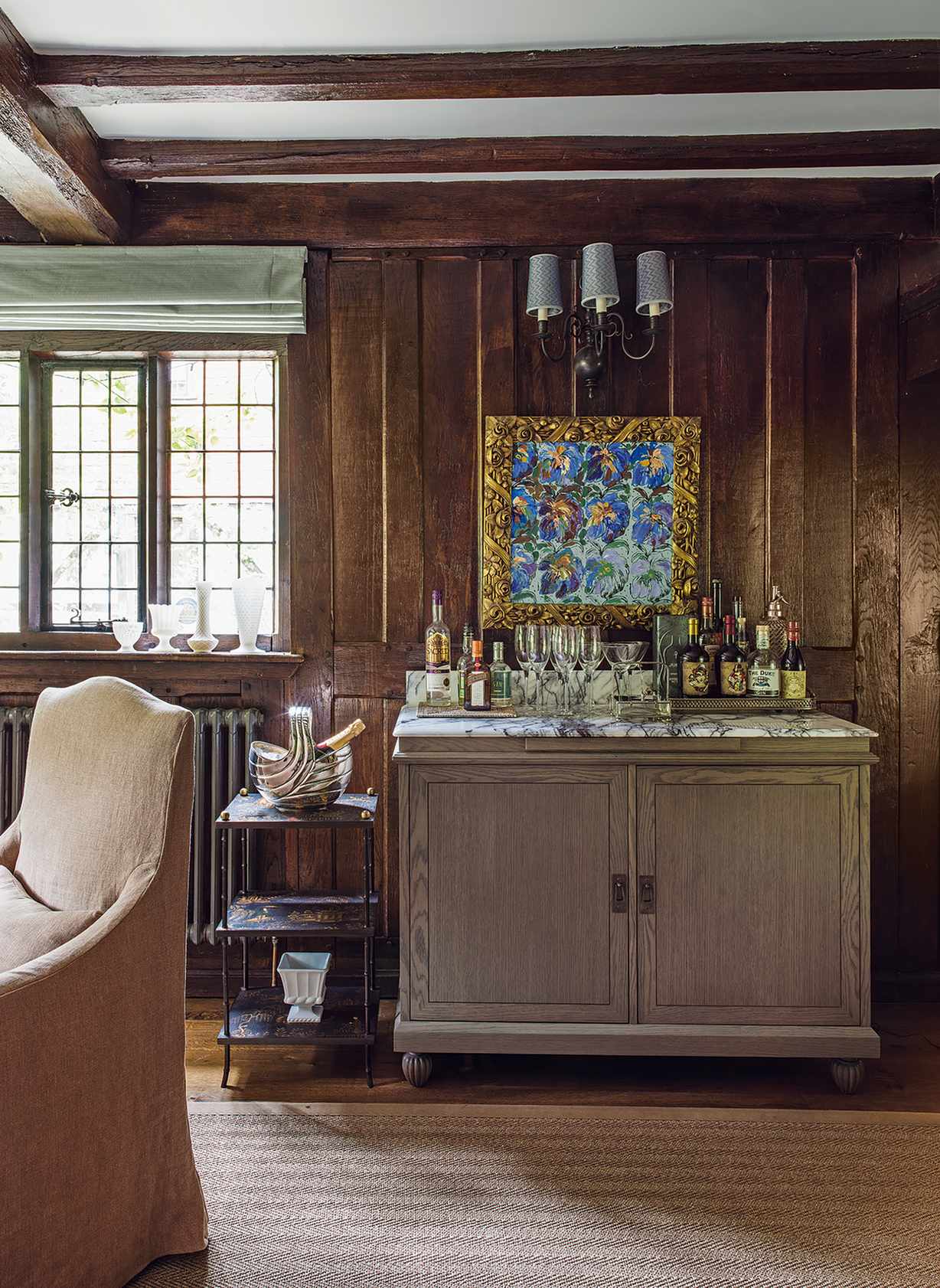 Console set up as a home bar in a living room