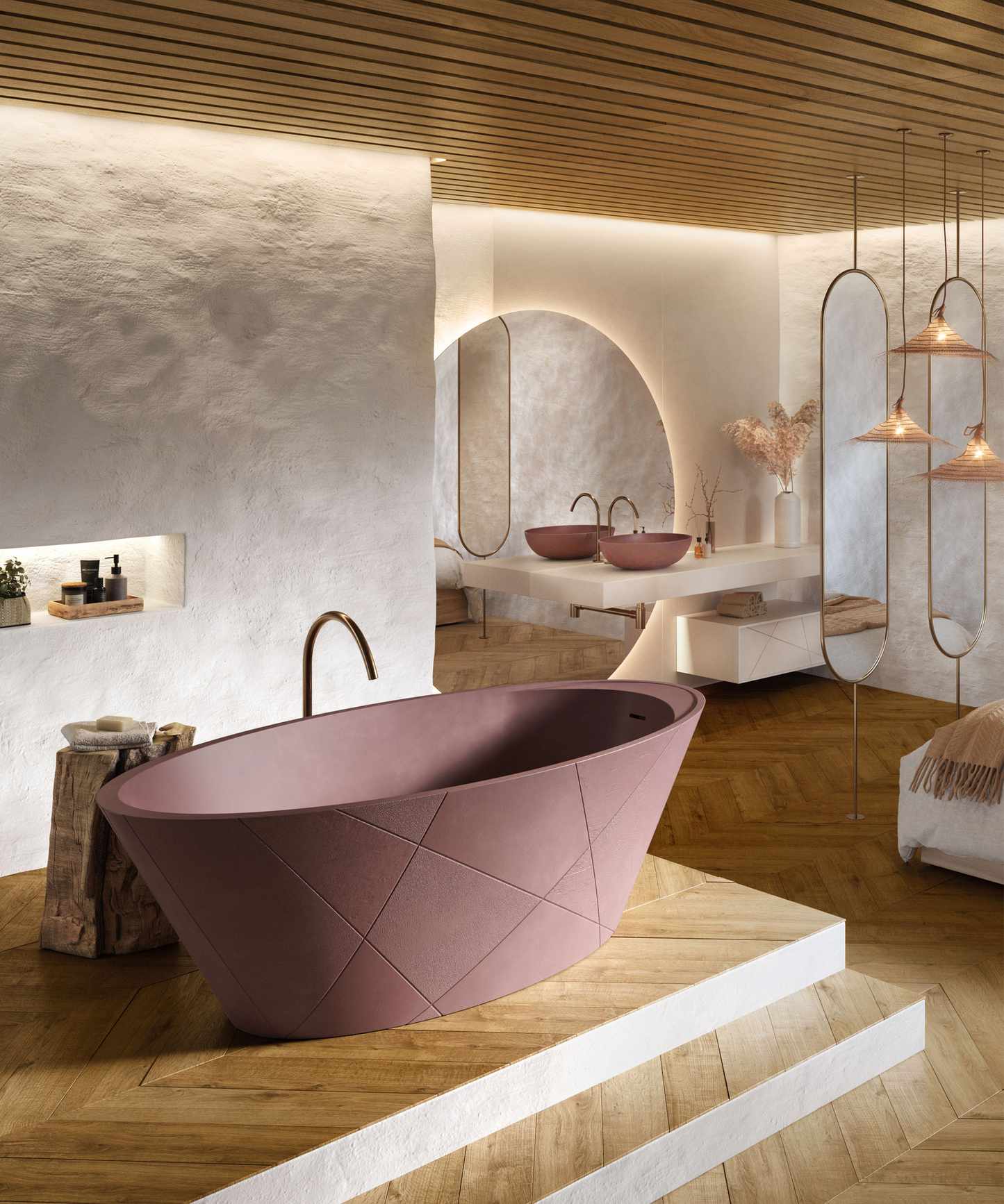 Spa like bathroom design with fluted, wooden paneled ceiling, textured white walls, large rounded mirror, two oval mirrors attached to the floor and ceiling, striking freestanding bath design in a warming taupe, matching sink, bath positioned on a stepped level, three hanging shades in a cluster, wooden accessories.