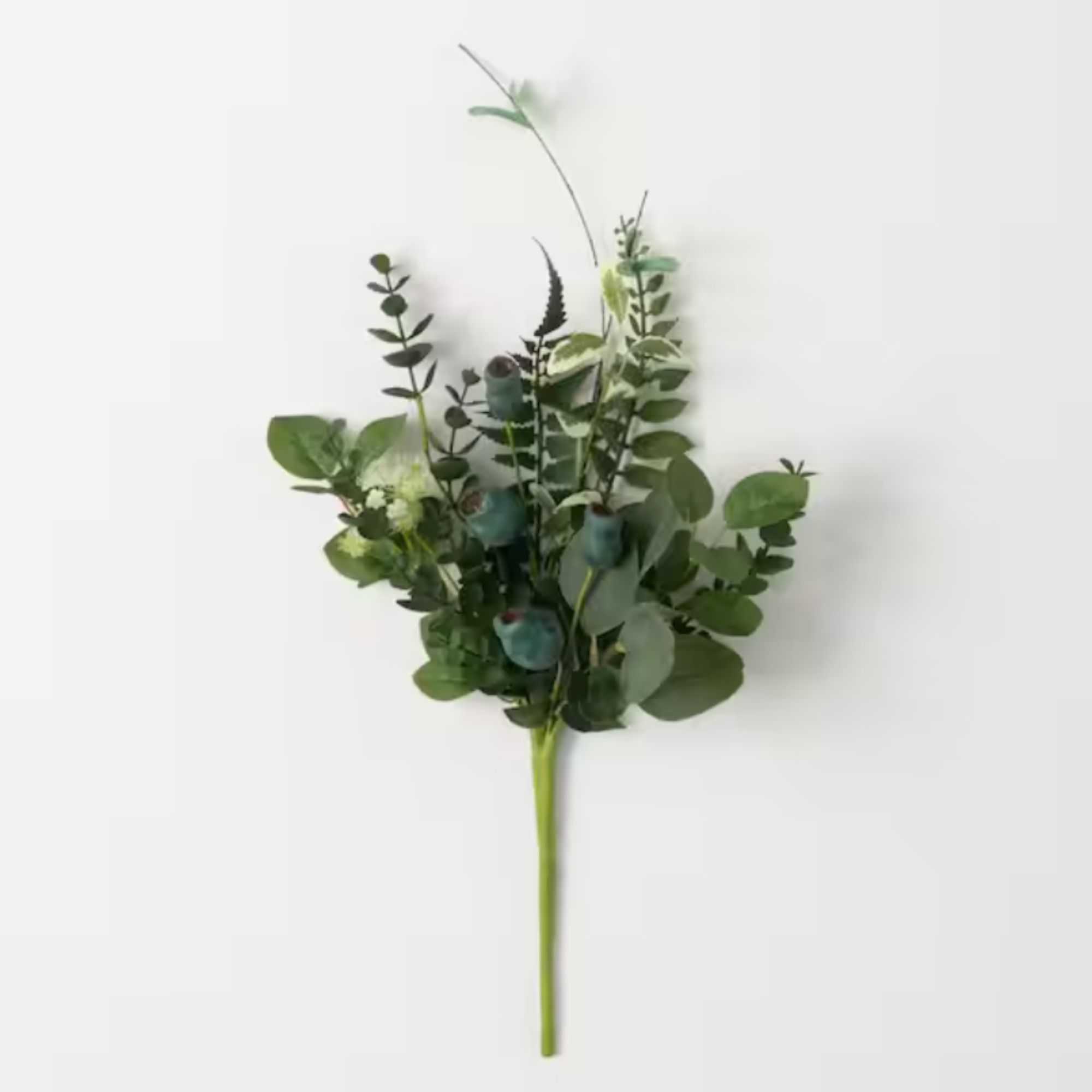 Sprig of faux foliage