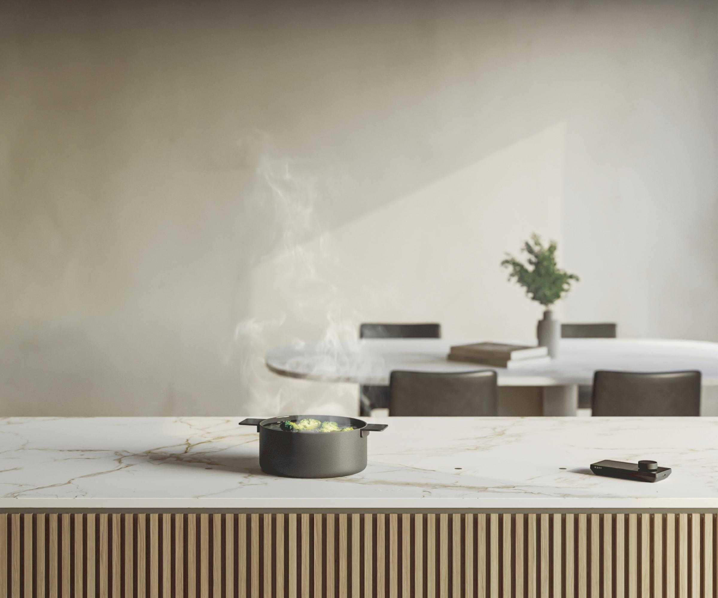 A pot boiling on Novy's UnderCover Induction Hob