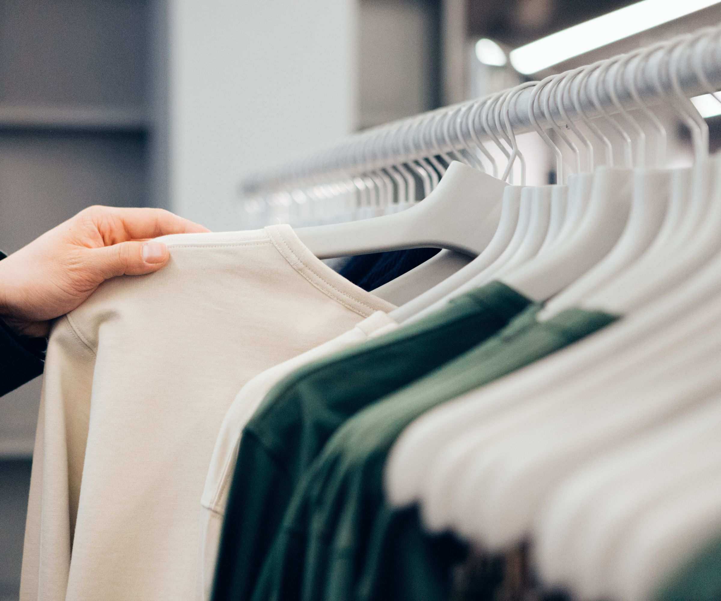 Clothes hanging neatly on a clothing rail