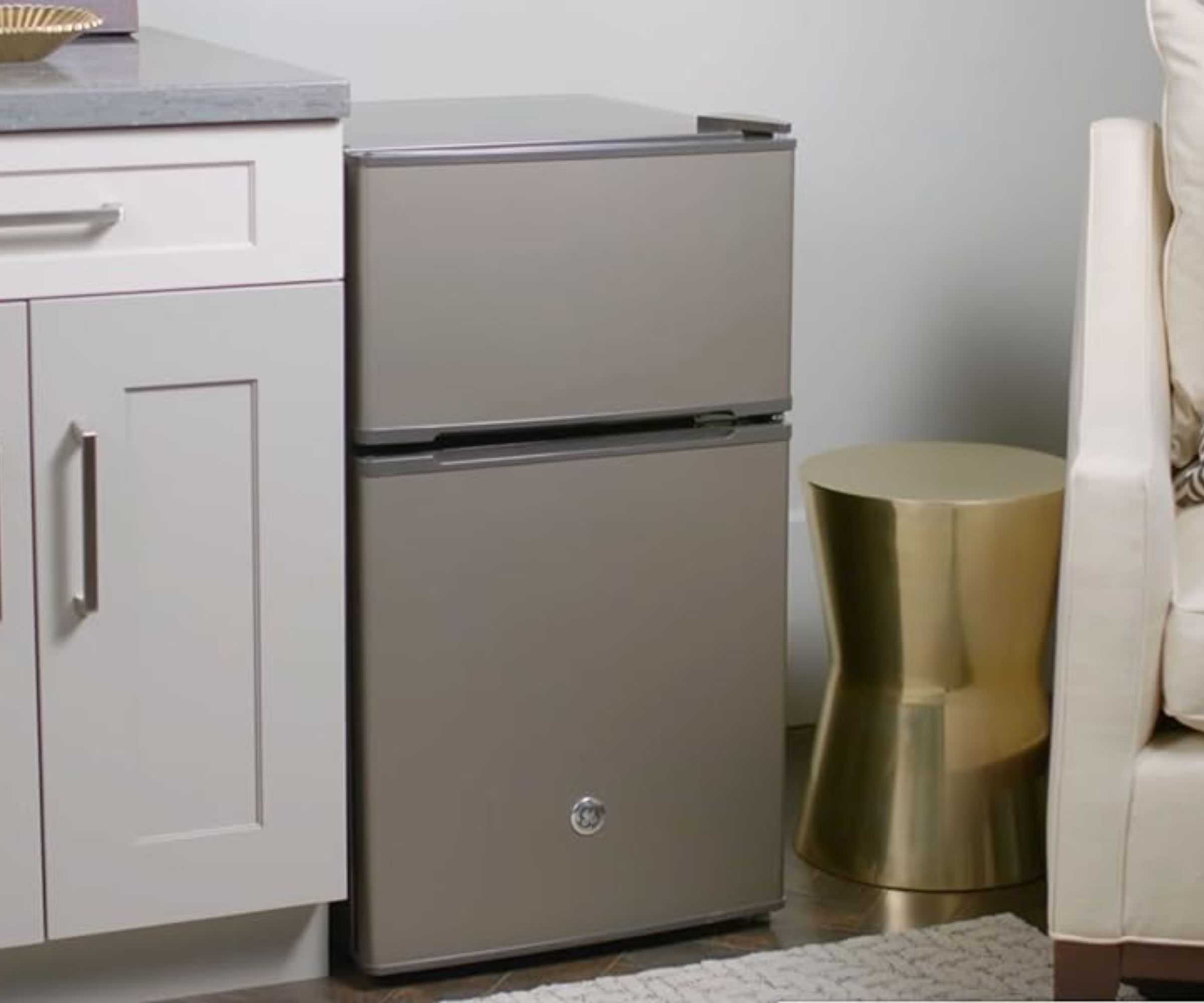 GE Double Door Mini Fridge in a lounge