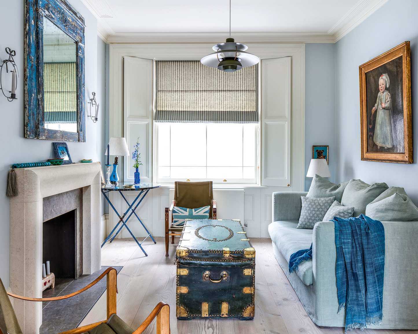 Luxury living room in small space with blue color scheme