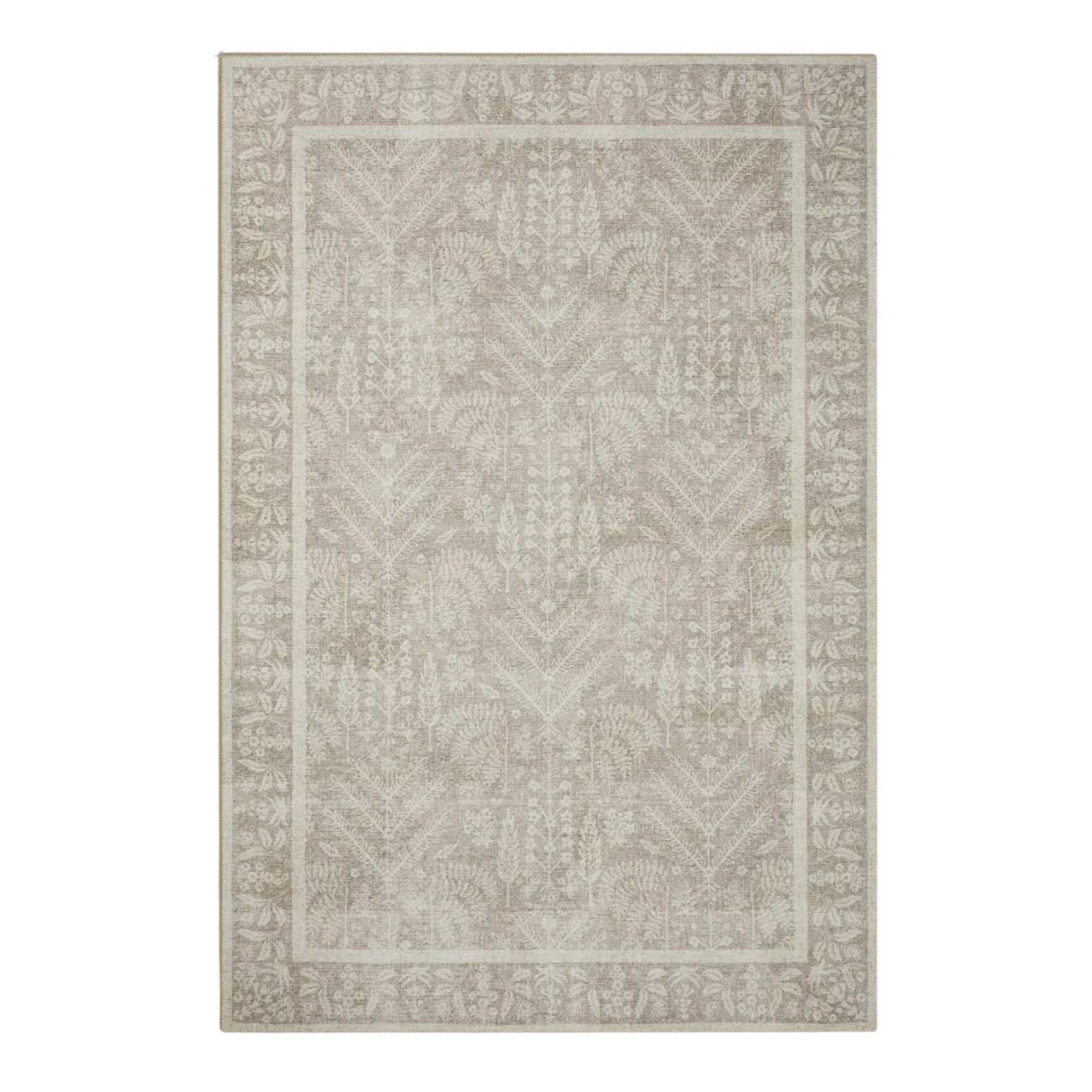 a soft green rug with whimsical detailing