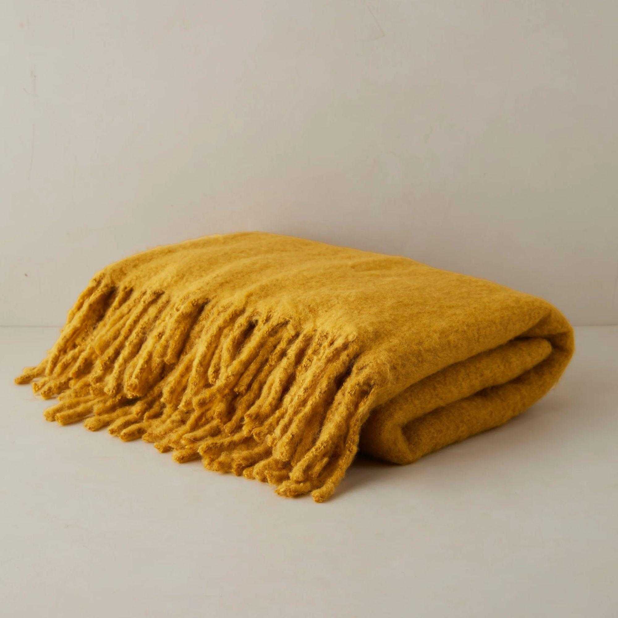 dark yellow throw blanket