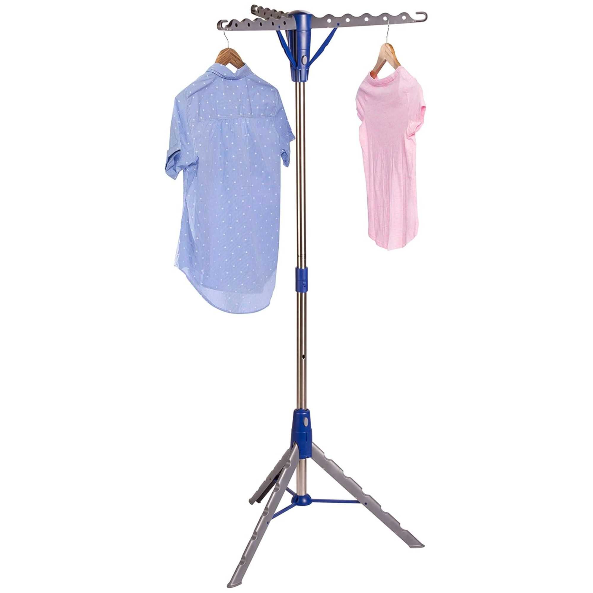 A metal clothes drying rack with a blue and pink shirt hanging up
