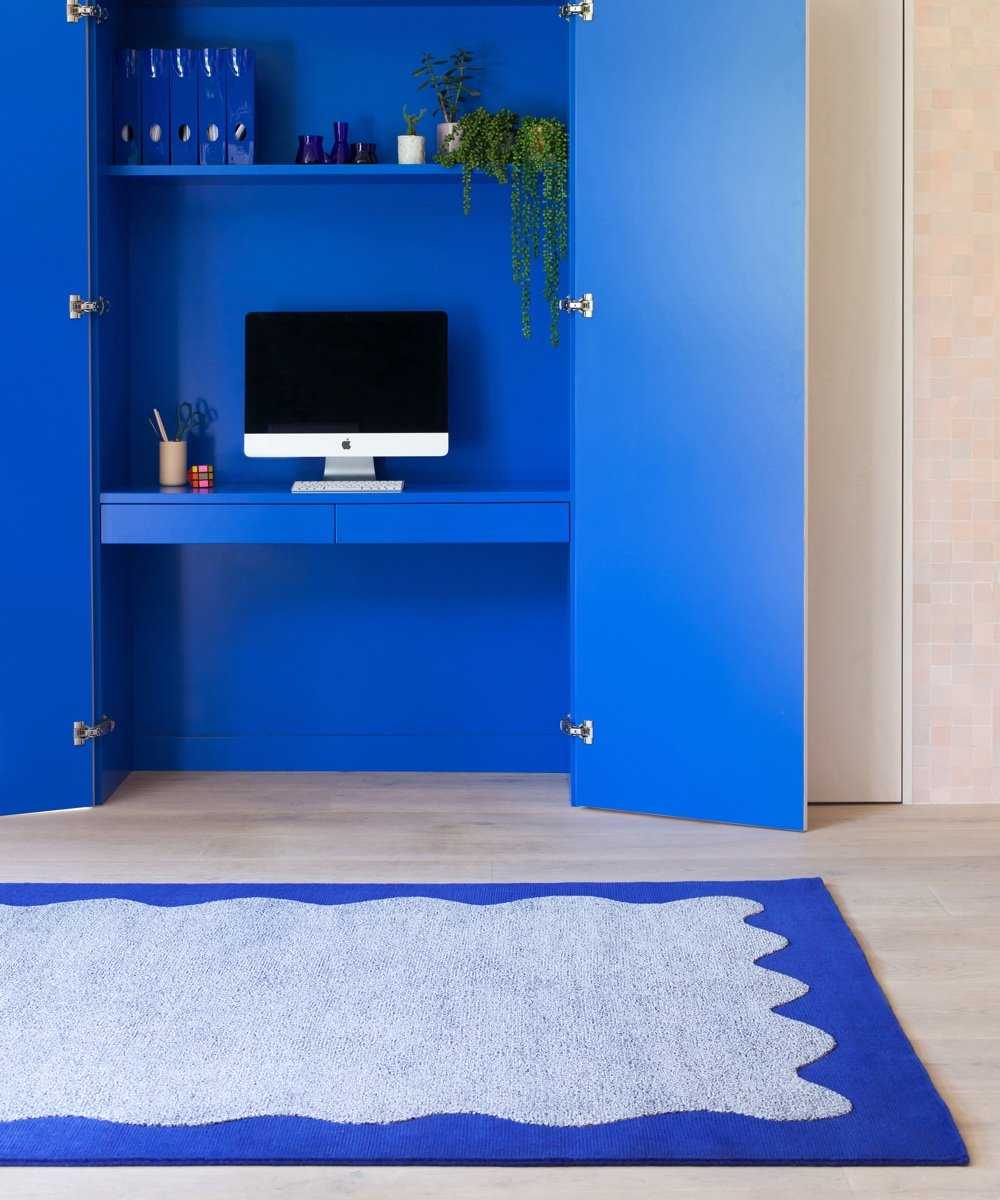 Desk hidden inside a wardrobe
