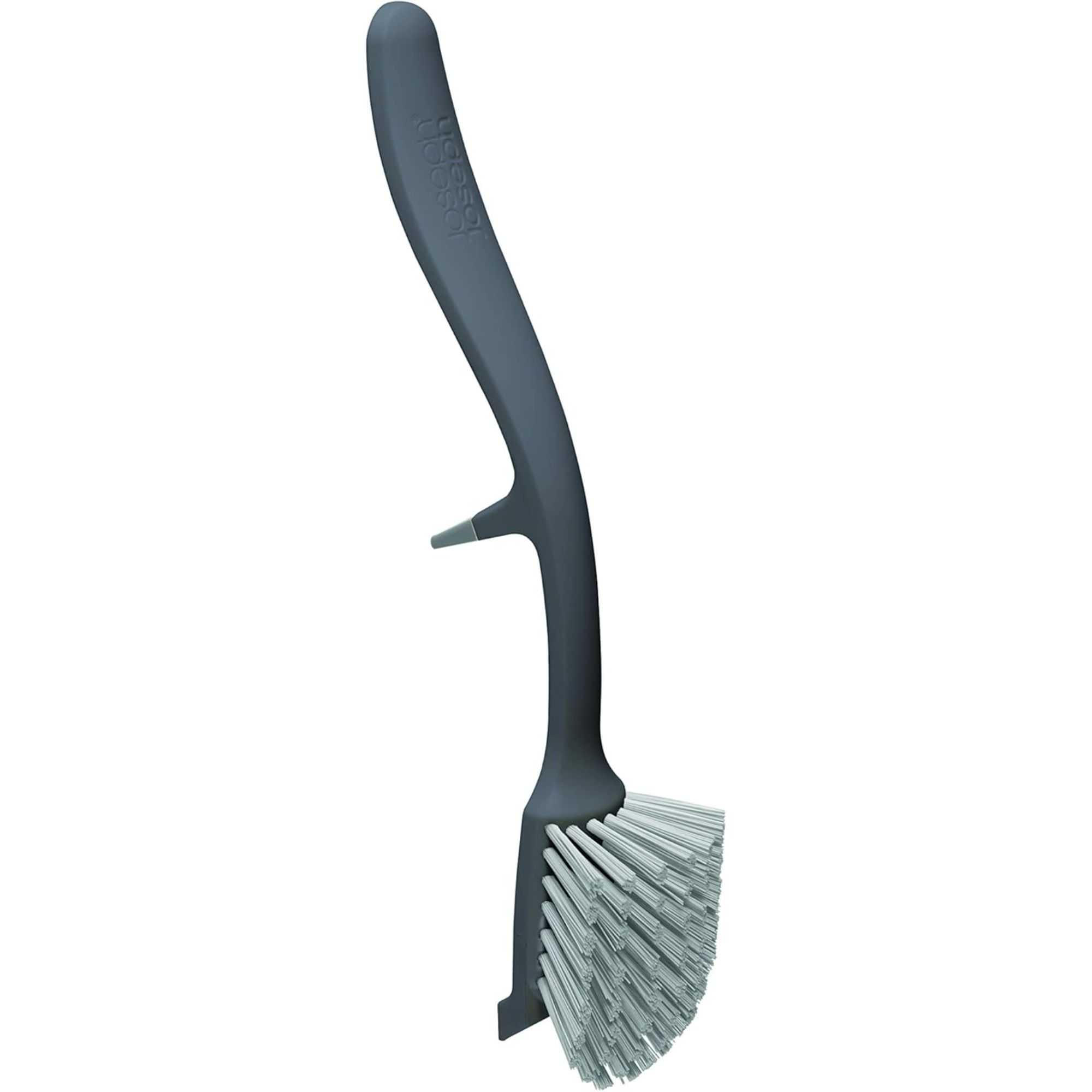 A dark blue Joseph Joseph dish brush