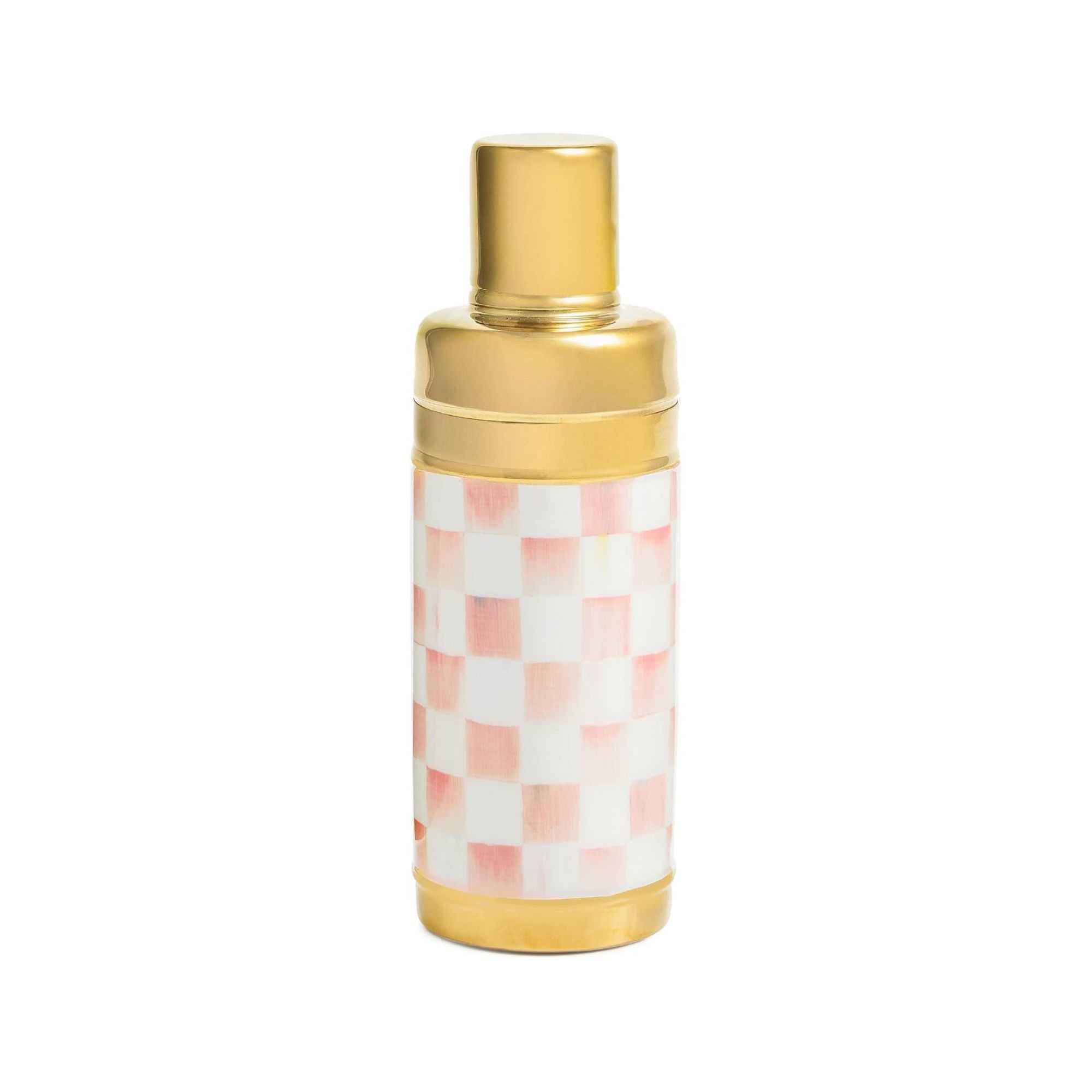 Gold cocktail shaker with pale pink check design